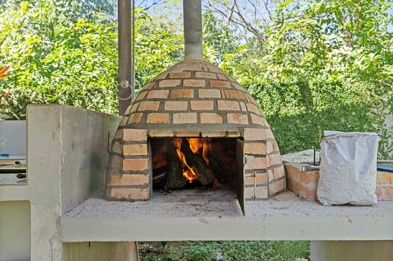 Beautiful 3-Story Property with 4 Apartments, Pool & Panoramic Comforts photo 12